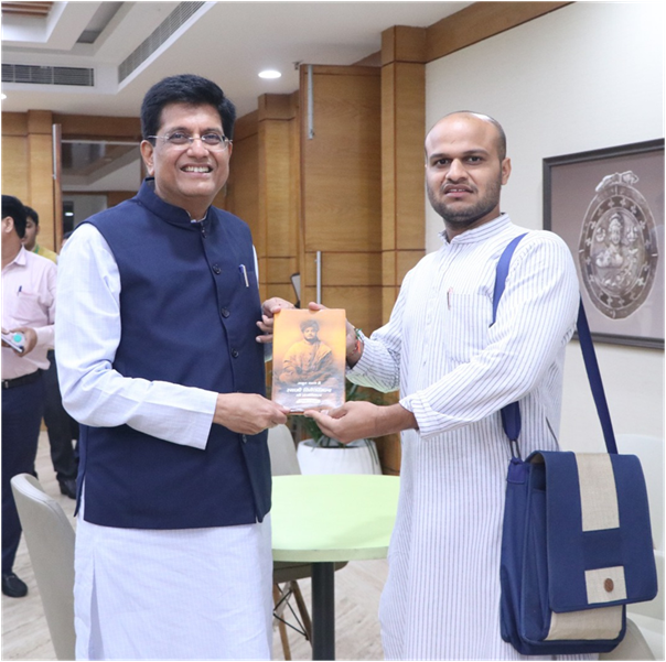 Dr. Nikhil Yadav with Shri Piyush Goyal